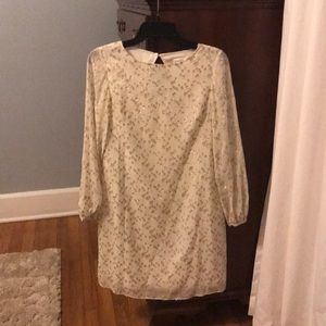 Sail to Sable Cream and gold dress